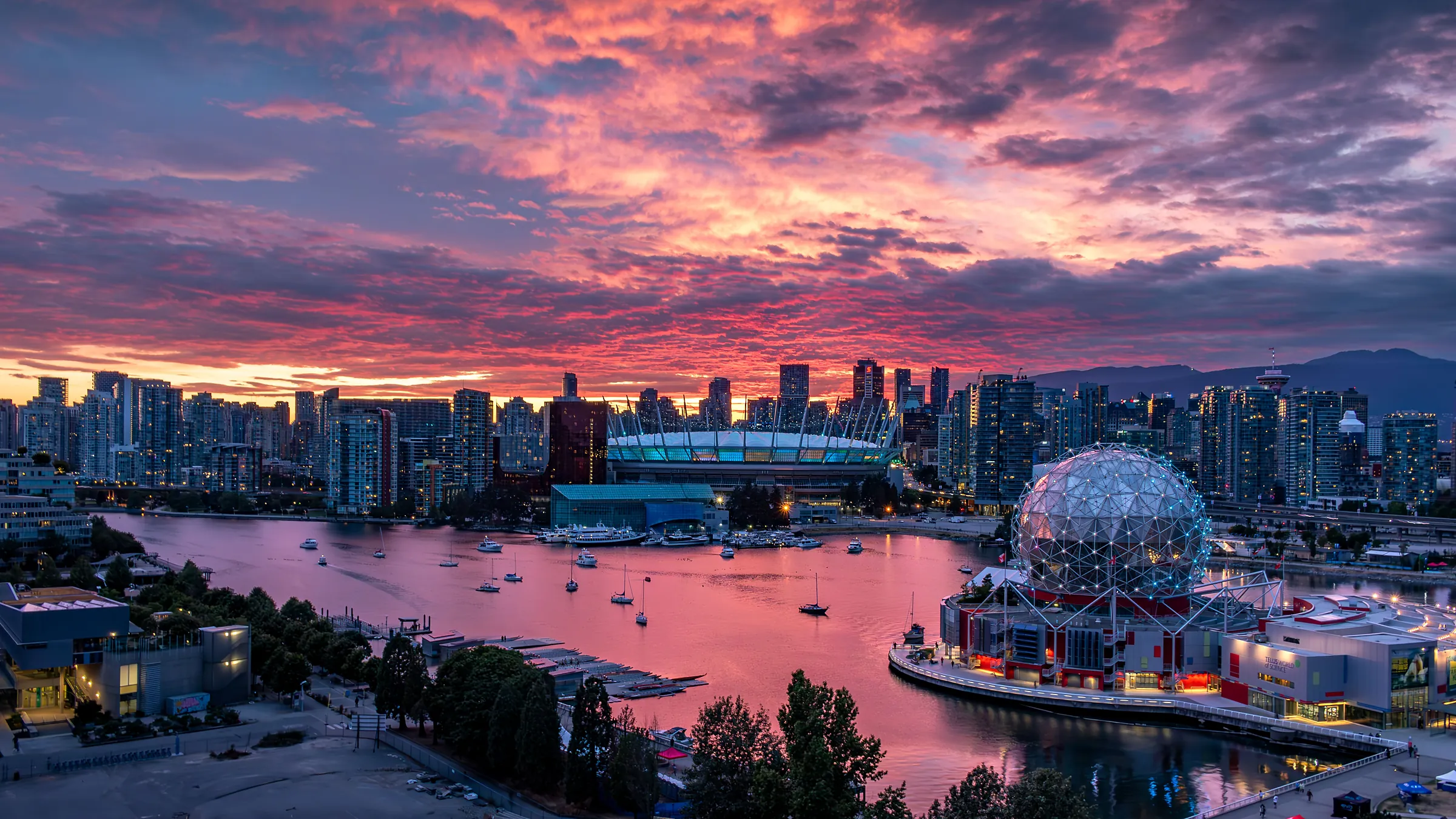 A group of students and host families gathered together at a welcome reception in Vancouver